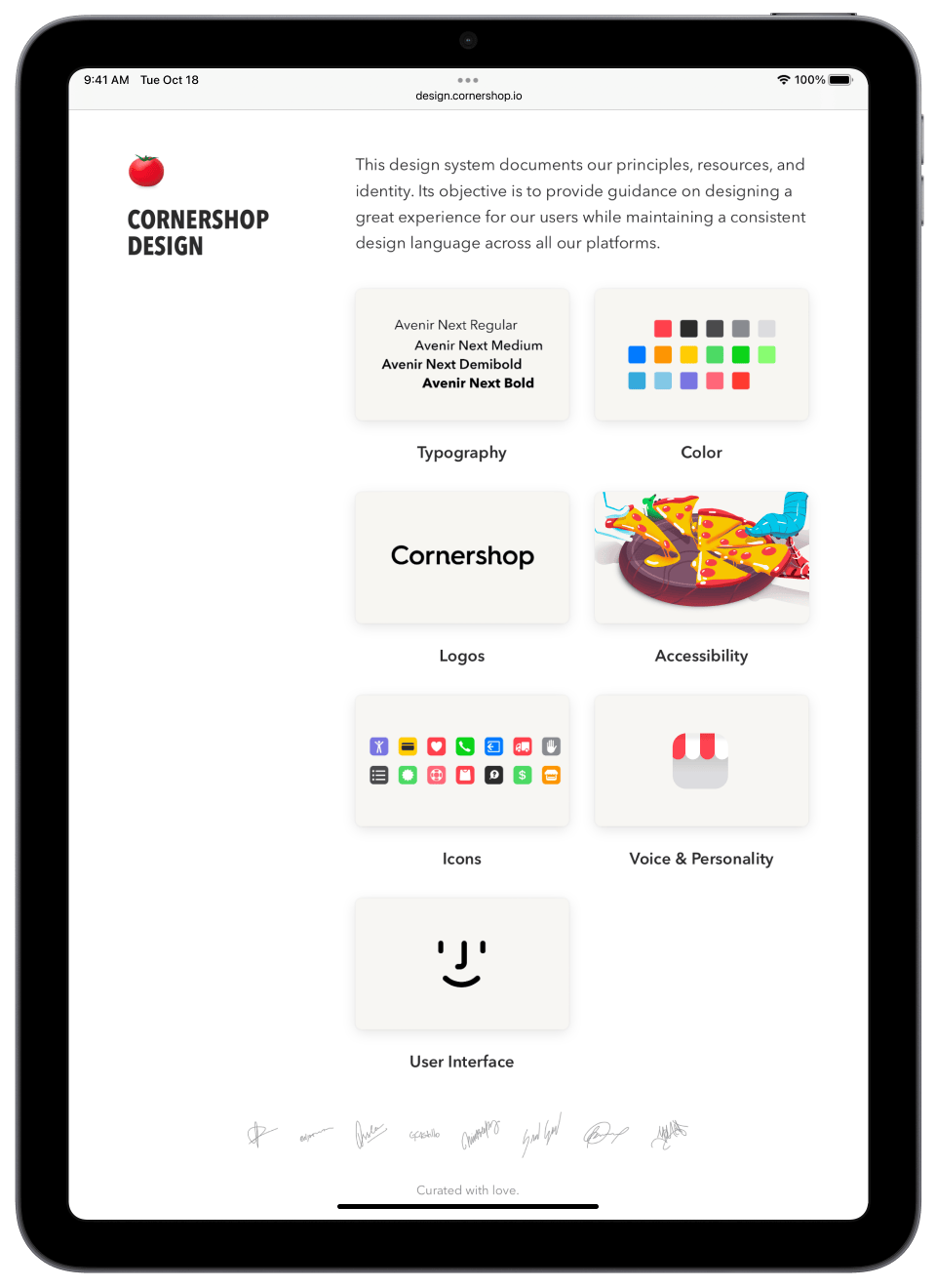 iPad Pro displaying a design principles website with illustrations.
